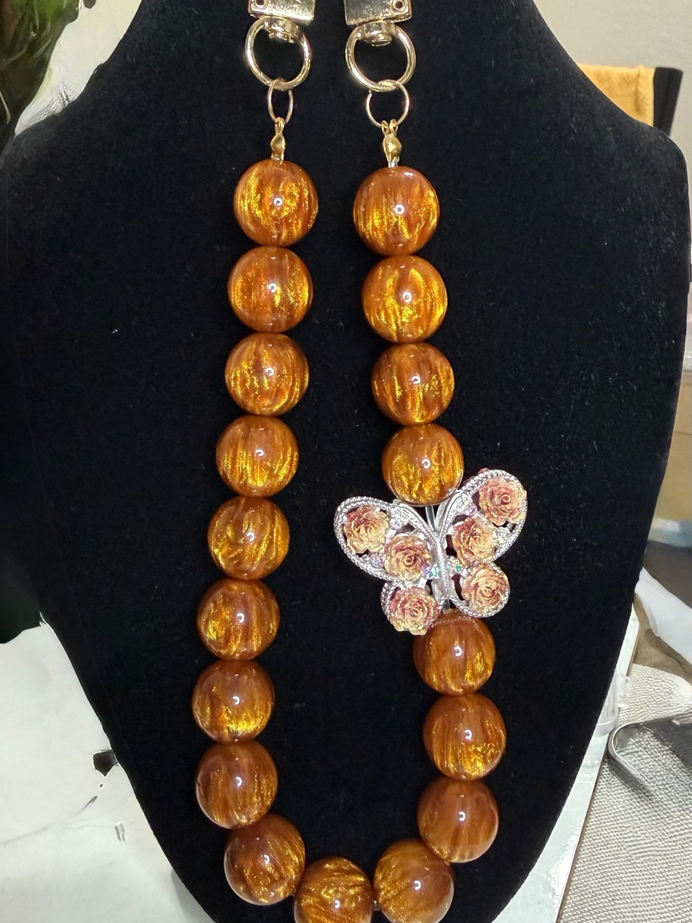 Handcrafted Amber-Glow Bead Bag charm/key holder with Butterfly Pendant